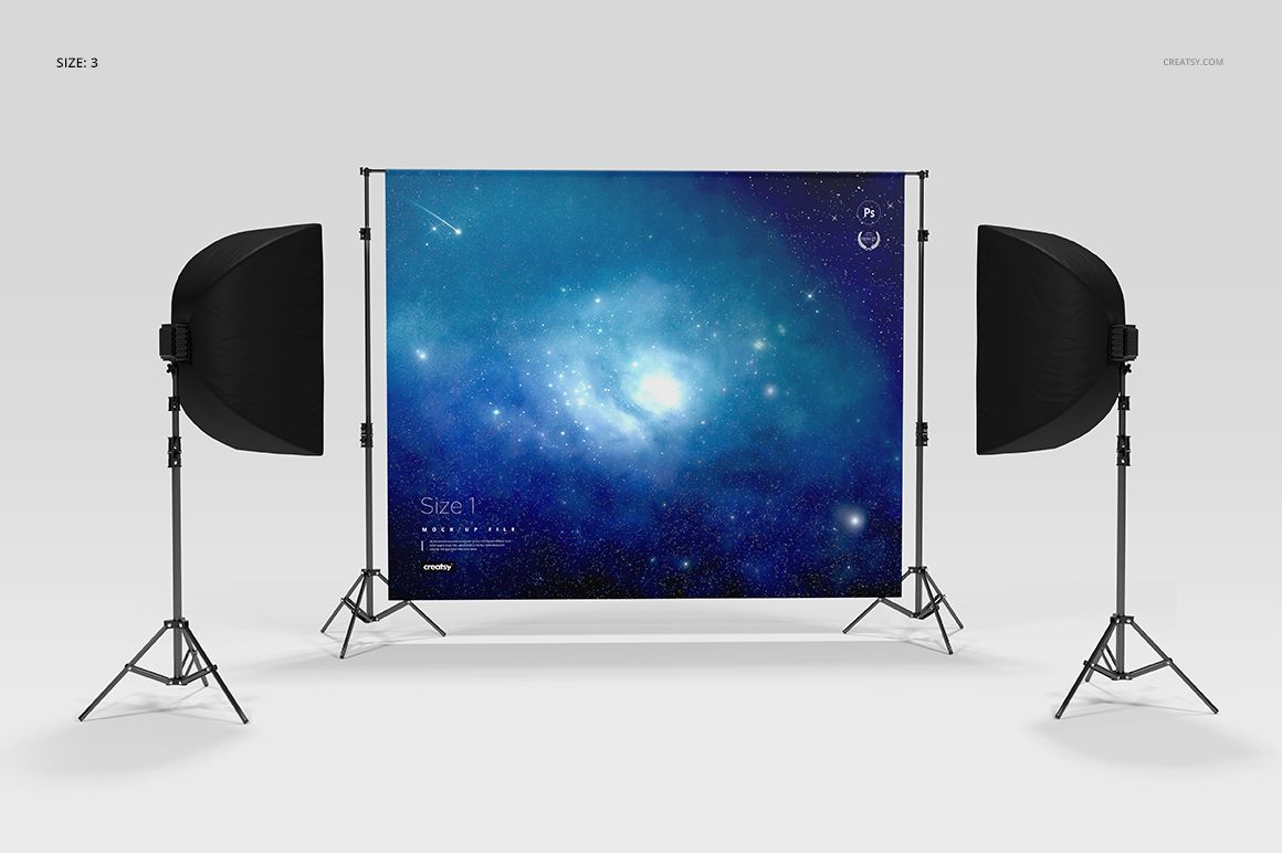 Custom printed backdrop mockup featuring a cosmic blue pattern, set up with two softbox lights, studio setting.