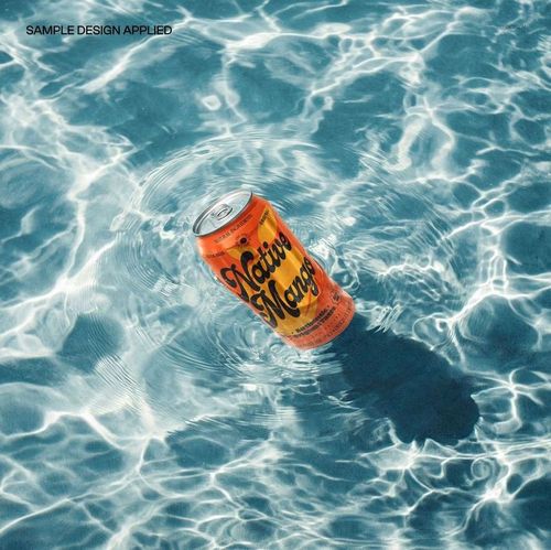 Floating drink can mockup in transparent shallow water, showing ripples and bright sunlight reflections.