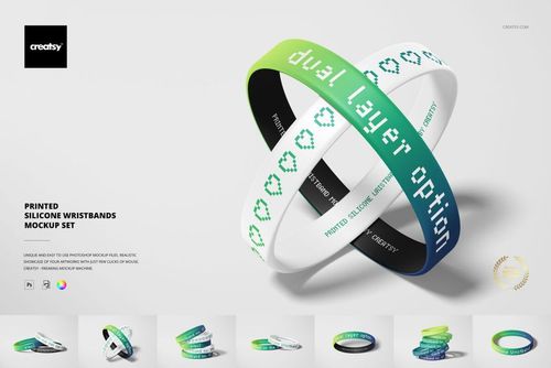 PSD mockup of silicone wristbands featuring dual layer designs in white, green, and blue, displayed from a front angle.