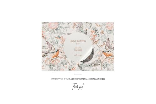Fabric bolt mockup featuring a detailed botanical print with birds and flowers, shown from a top perspective.