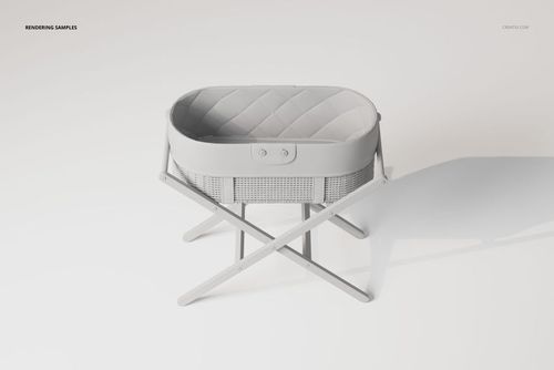 Front view of a boho style bassinet with quilted fabric interior and woven sides, set on crossed wooden legs.