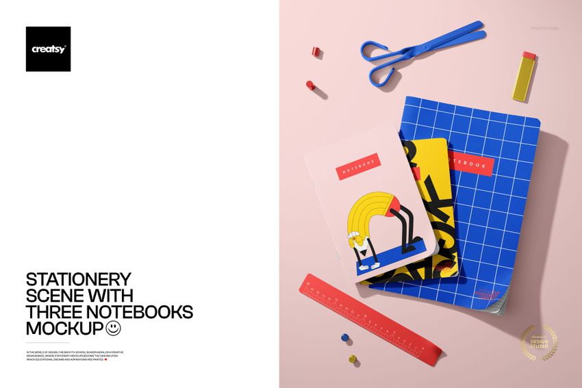 PSD mockup showing three distinct notebooks in different designs, surrounded by red ruler and small erasers on a pink desk.