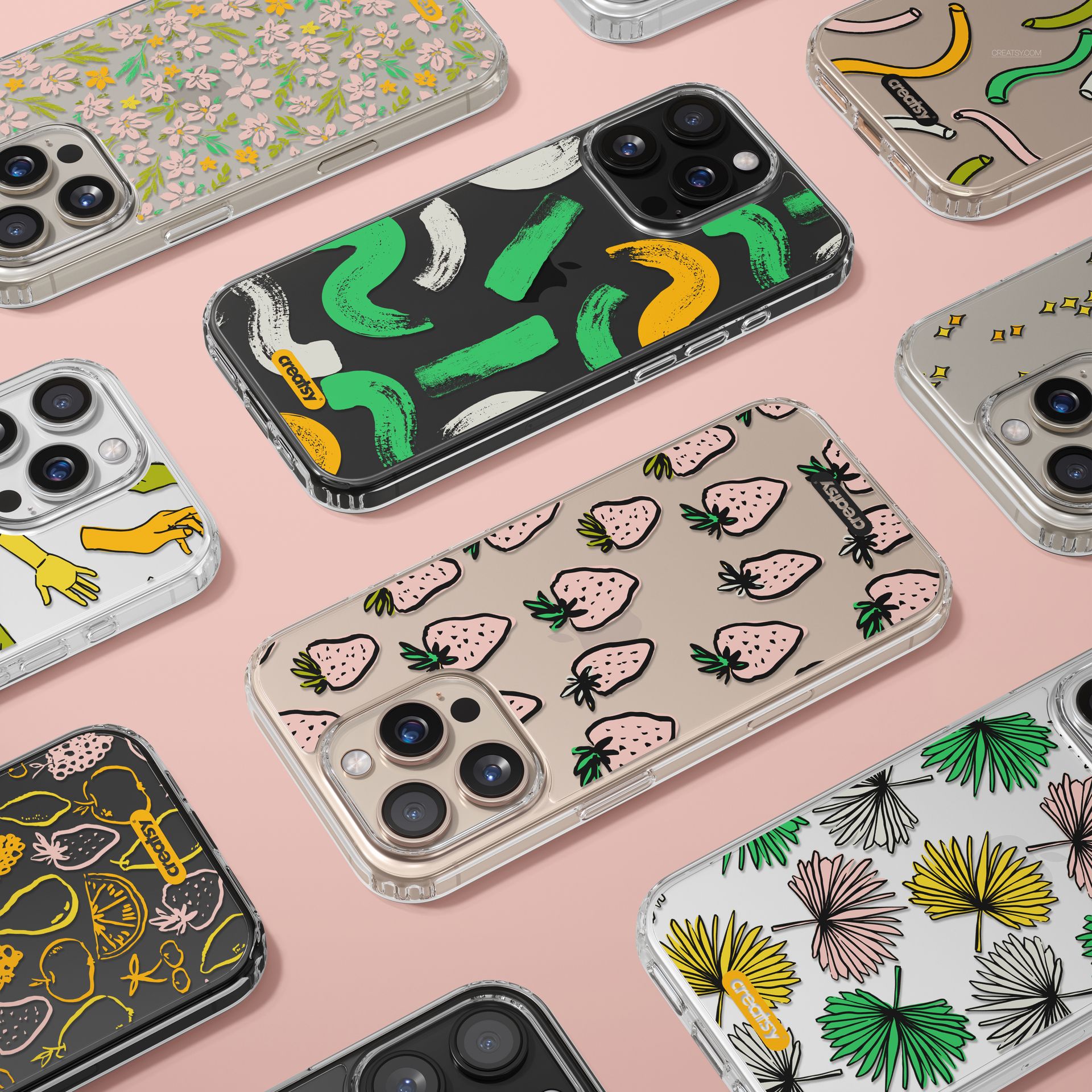 PSD mockup set showing iPhone 16 Pro Max cases with transparent backgrounds and various playful graphic prints.