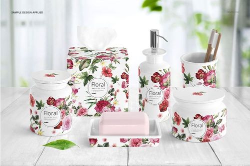Front view of bath accessories mockup featuring porcelain containers and soap dish, decorated with pink and red floral designs.