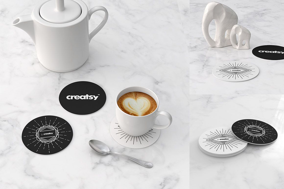 PSD mockup of circular coasters featuring minimal line art, placed near a spoon, teapot, and decorative sculpture.