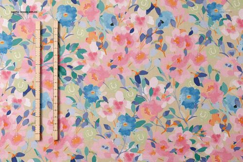 Cotton fabric mockup shown from above, decorated with pink, blue, and green flowers, with rulers for scale.