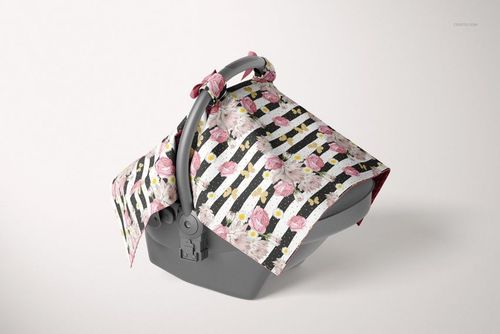 Mockup of a baby car seat with a minky canopy cover featuring pink roses and black striped design, front perspective.
