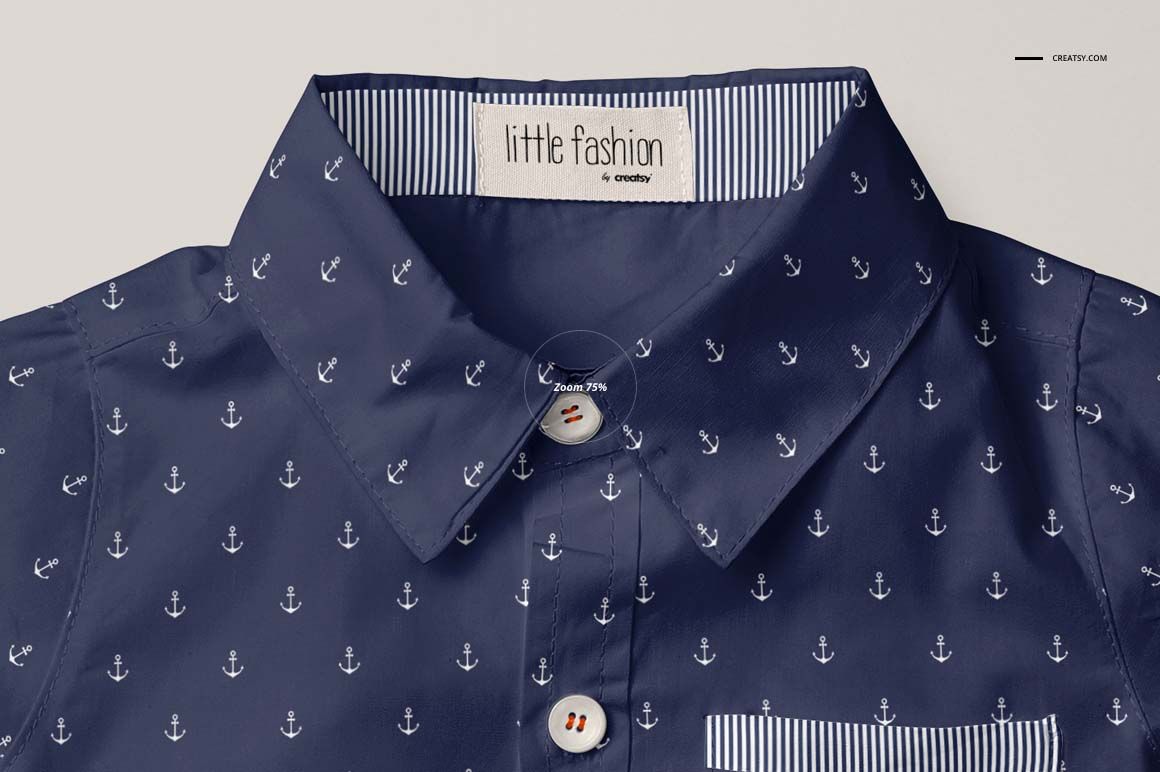 Close-up front view of a boys formal shirt mockup in navy blue with small white anchor pattern and striped collar lining.