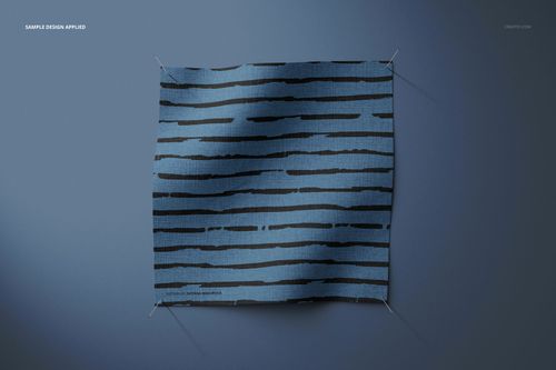 Blue fabric swatch mockup featuring uneven black horizontal lines, displayed flat and pinned against a neutral background.