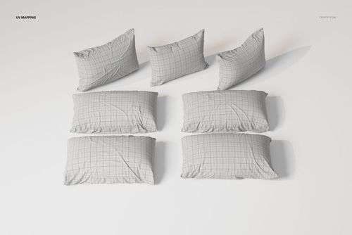 Rectangular sleeping pillows with a subtle grid pattern arranged in two rows on a plain white surface, top view.