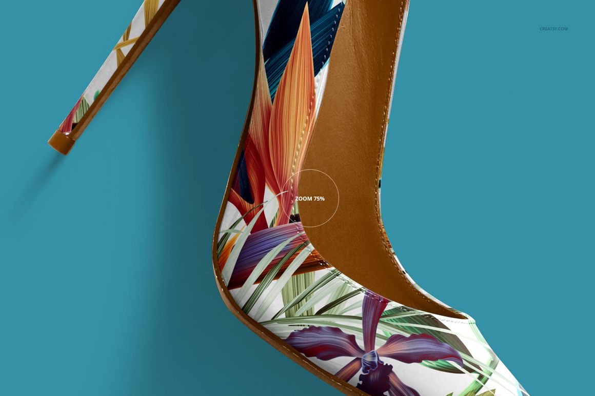 Close-up front view of a high heel shoe with a colorful floral pattern on a blue background, mockup style.