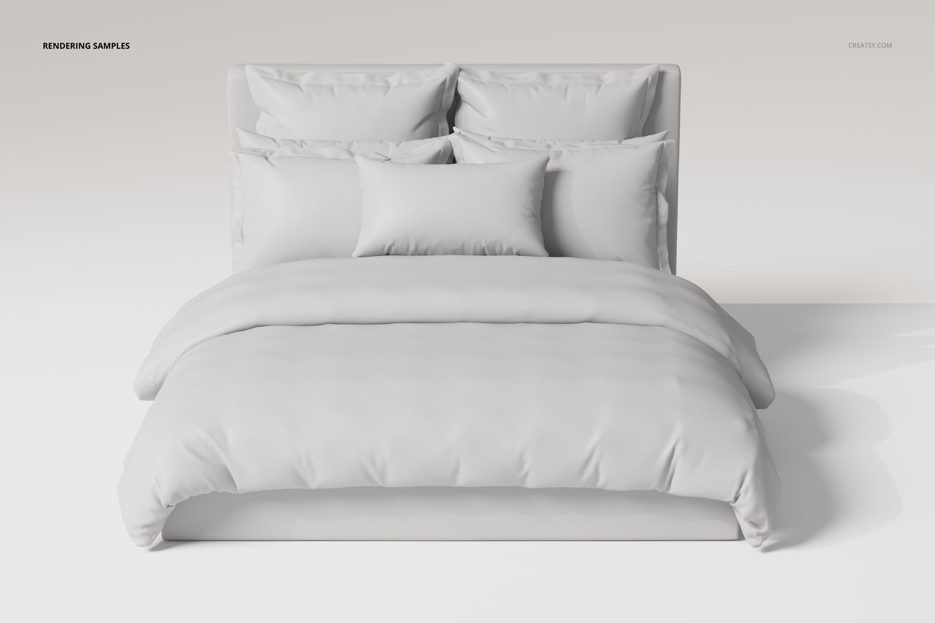 Front view of a bedding set with ruffled pillows and a duvet in solid white, arranged on a modern bed frame.