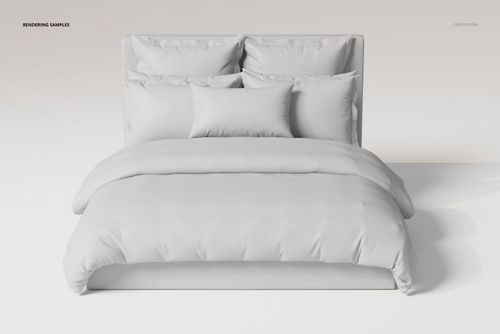 Front view of a bedding set with ruffled pillows and a duvet in solid white, arranged on a modern bed frame.