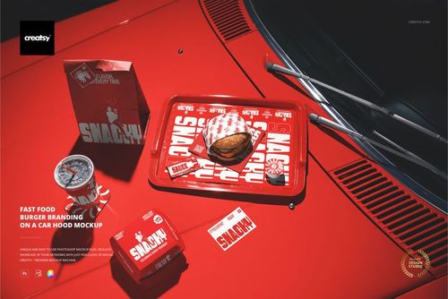 PSD mockup featuring fast food items and packaging on a bright red car hood, with visible tray and drink cup.