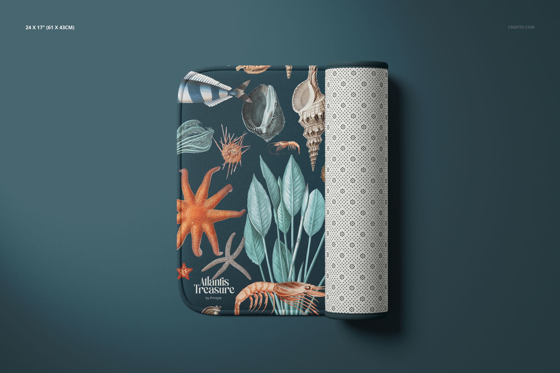 Microfiber bath rug mockup displayed folded, showing oceanic designs and a geometric underside on a blue surface.