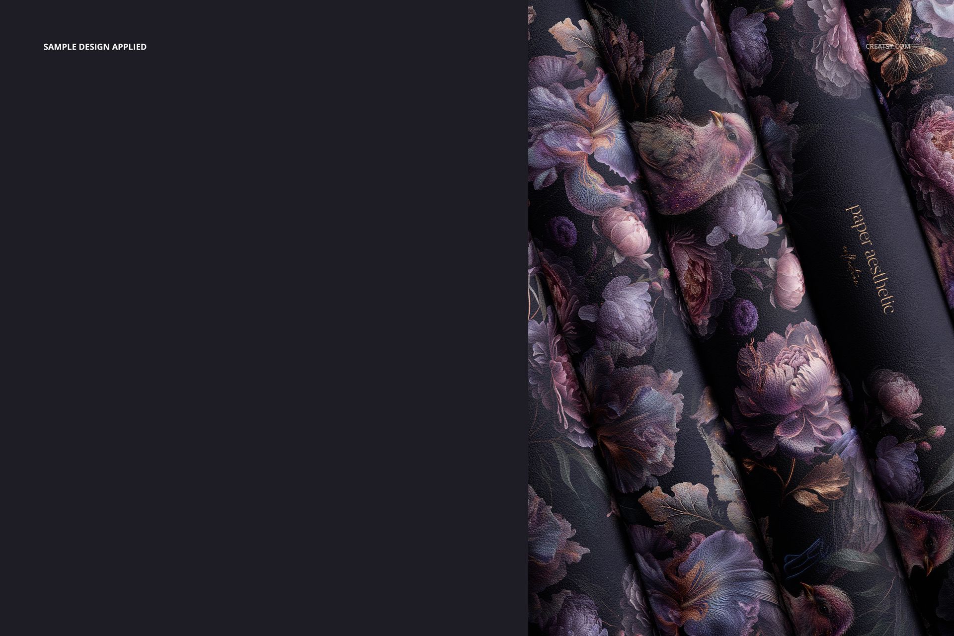 Rolled non-woven vinyl wallpaper mockup with dark floral pattern, viewed from above on a flat surface.