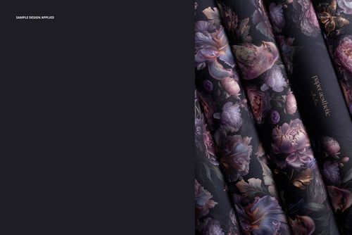 Rolled non-woven vinyl wallpaper mockup with dark floral pattern, viewed from above on a flat surface.