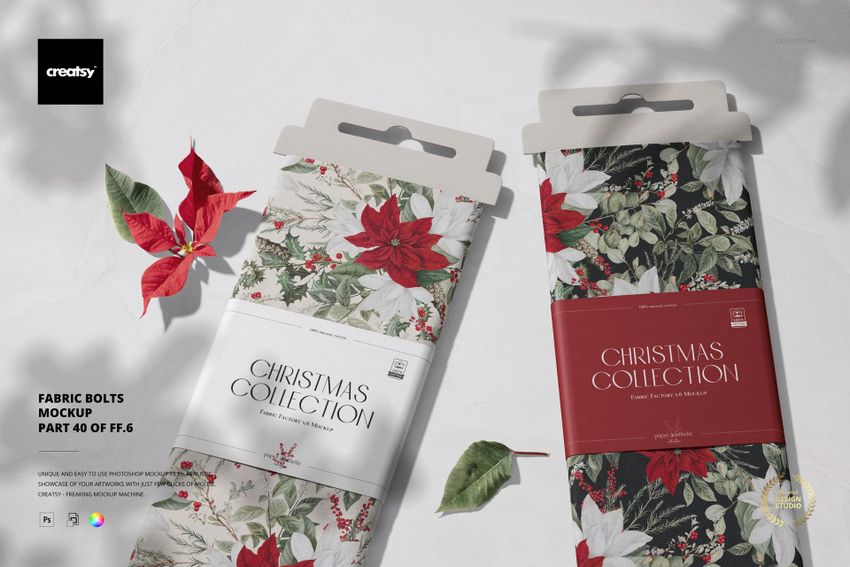 Fabric bolts mockup featuring festive red and green botanical designs, arranged on a neutral background with holiday props.