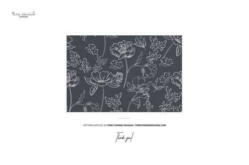 PSD mockup showing a rectangular fabric piece with delicate white botanical outlines on a muted dark gray surface.