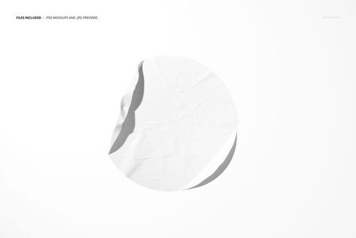 White circular sticker mockup with crumpled texture and curled edge, displayed from above on a clean surface.
