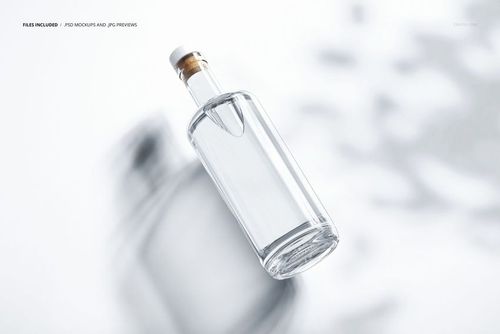 Classic corked glass bottle mockup shown in a floating position with transparent body and wooden cork on a light surface.