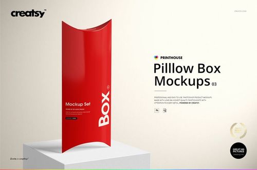 Red pillow box mockup displayed vertically on a neutral surface, featuring clear white lettering and minimal props.