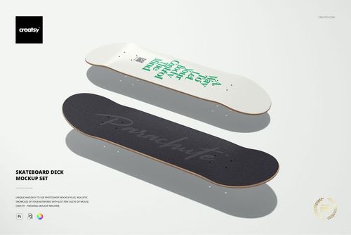 Skateboard deck PSD mockup featuring a pair of decks, one with white and green design, one with black grip, shown from above.