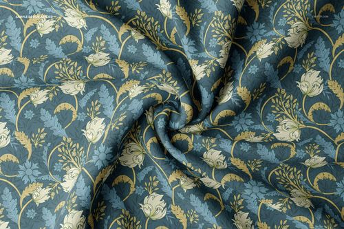 Double brushed polyester fabric mockup with a blue and beige floral pattern, shown in a close-up top view with visible folds.