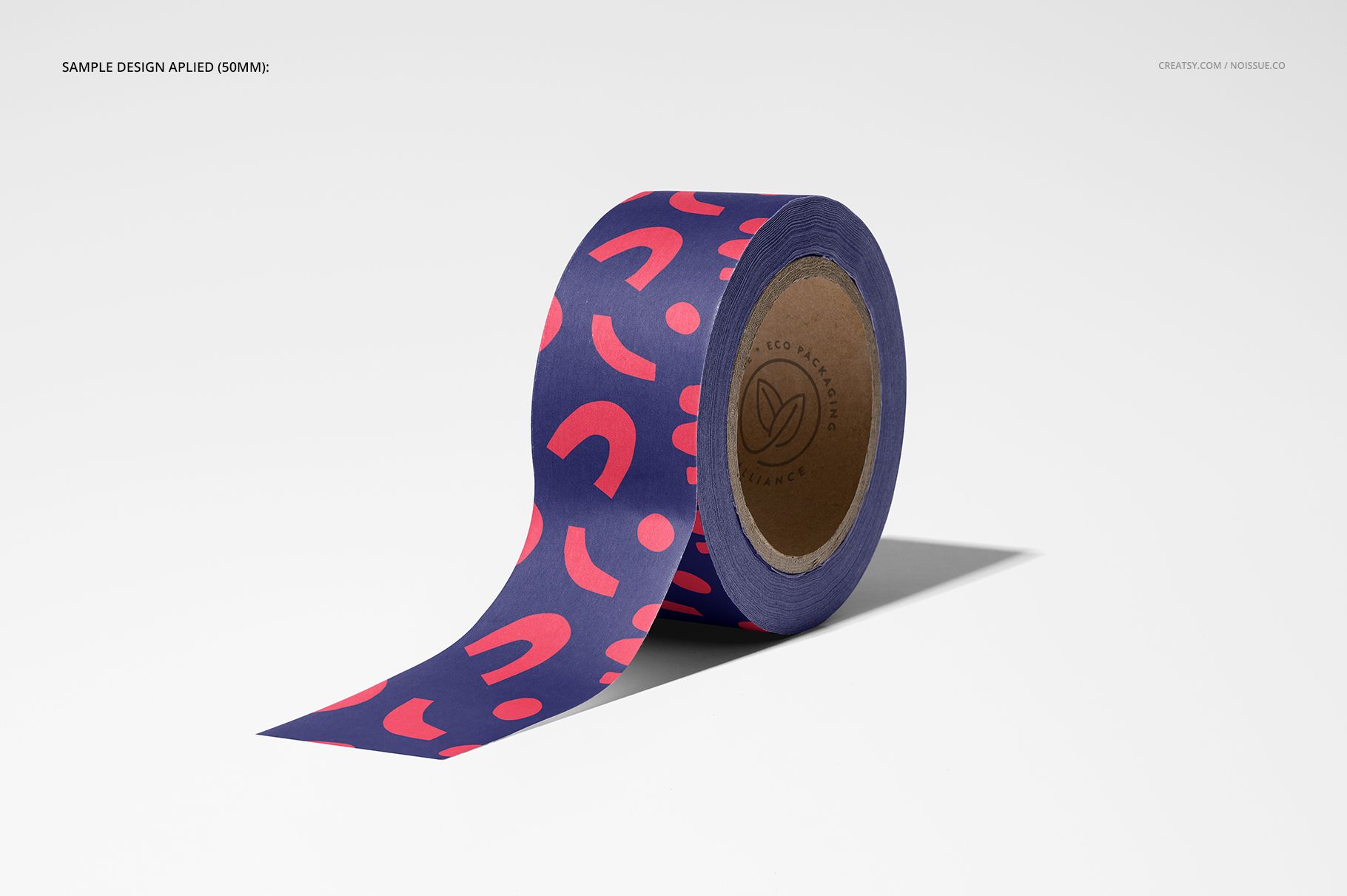 Mockup of a packing tape roll featuring a bold purple and pink pattern, displayed at an angle on a plain backdrop.