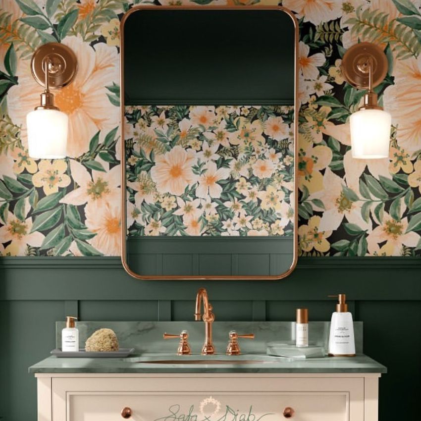 Bathroom mockup featuring a vanity with a green marble countertop, gold fixtures, and a floral tropical wallpaper background.