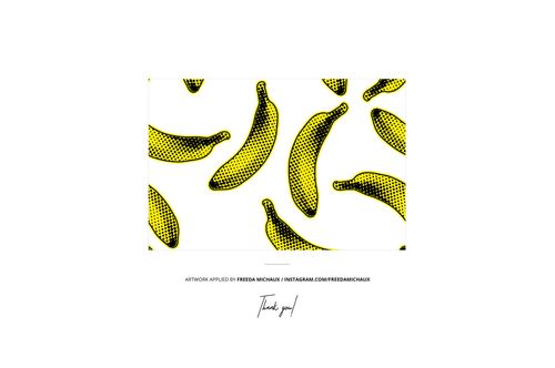 High cuff socks mockup featuring a repeating pattern of yellow bananas with black dots on a white background, front view.