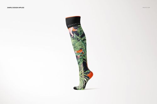 Single knee high sock mockup with tropical leaf and flamingo pattern, side view on a plain white background.