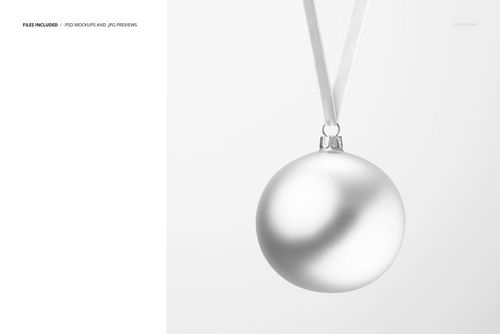 Close-up of a round satin Christmas bauble with smooth metallic finish, suspended by a velvet ribbon in a PSD mockup.