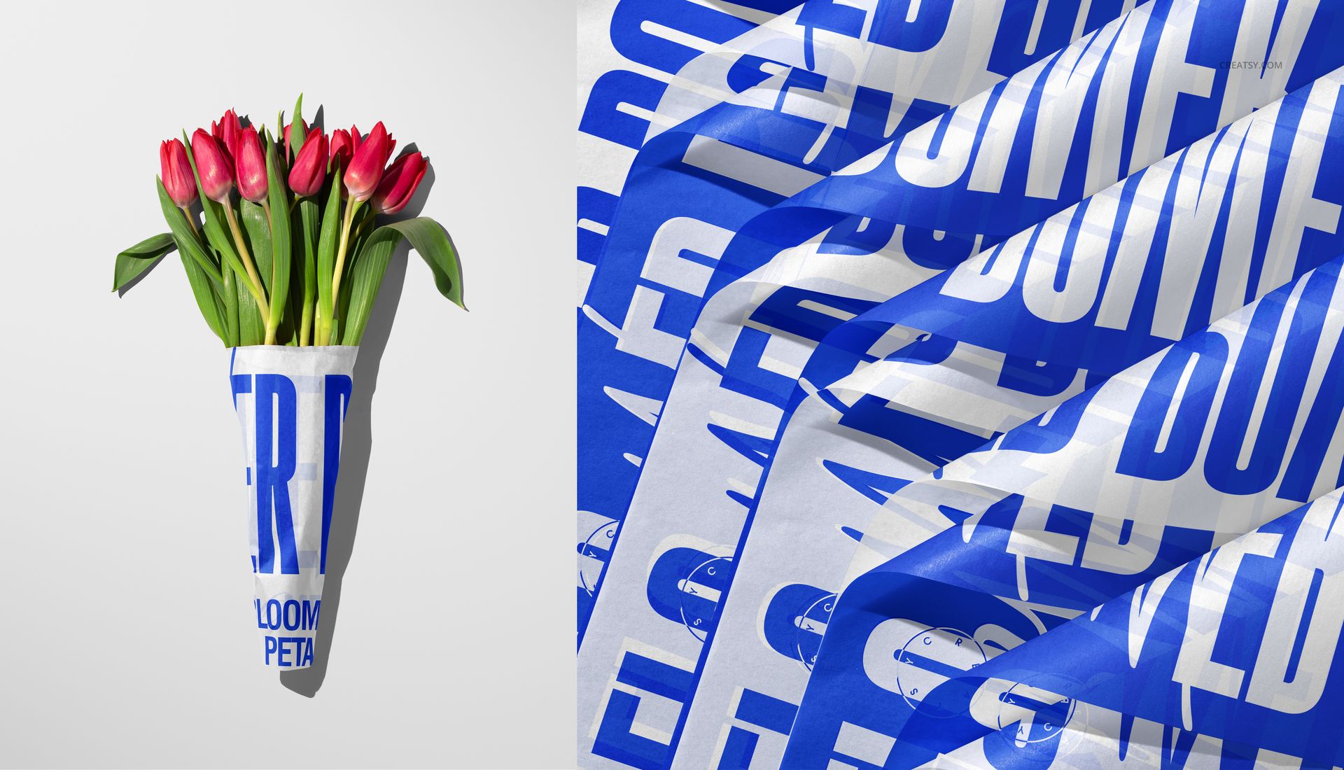 Bouquet of red tulips wrapped in white tissue paper with bold blue text, shown from a front angle on a light background.