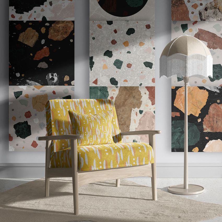 Interior mockup scene with a wooden armchair featuring a yellow patterned fabric and a floor lamp on a light rug.