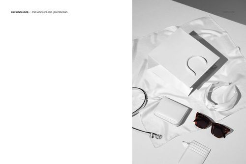 Fashion accessories mockup showing a silk scarf, headband, wallet, belt, card holder, sunglasses, and shopping bag in a minimalist, sunlit composition.