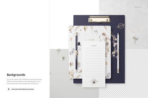Top-down view of a stationery mockup set with floral patterns, clipboard, notepad, pen, and decorative props.