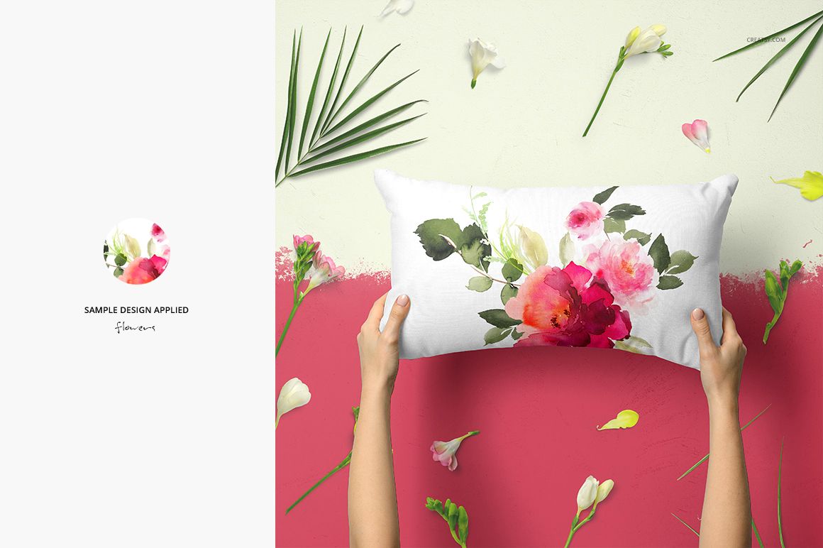 Front view of a rectangular pillow mockup featuring a colorful floral pattern, placed on a pink and white surface.
