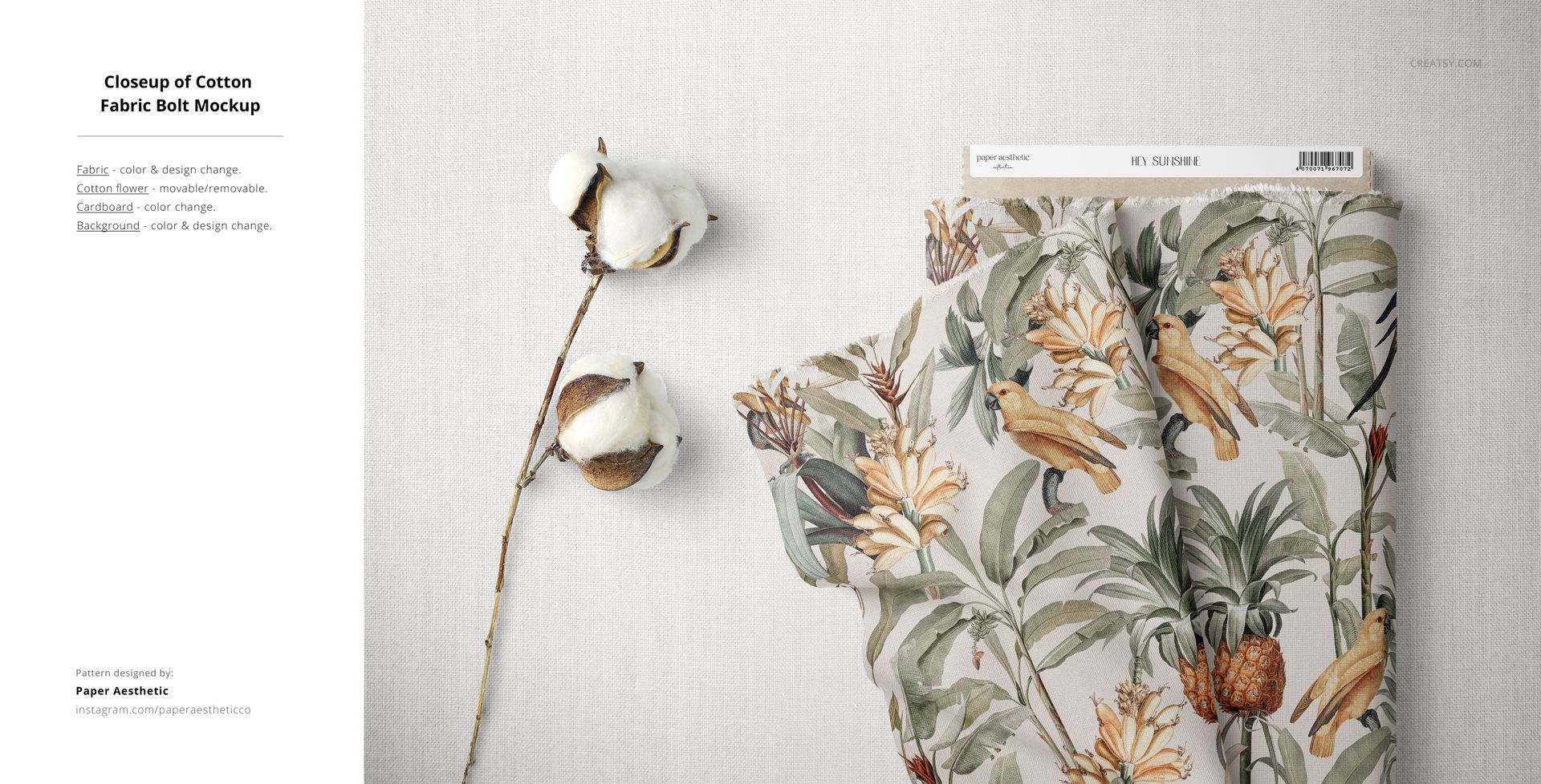 Close-up view of a cotton fabric mockup with a tropical botanical and bird pattern, placed on a light surface.