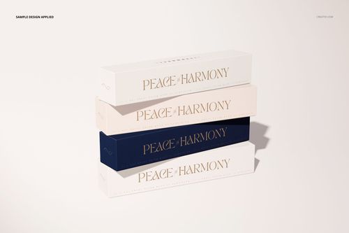 PSD mockup of yoga mat boxes arranged in a pile, featuring clean typography and soft color palette, angled perspective.