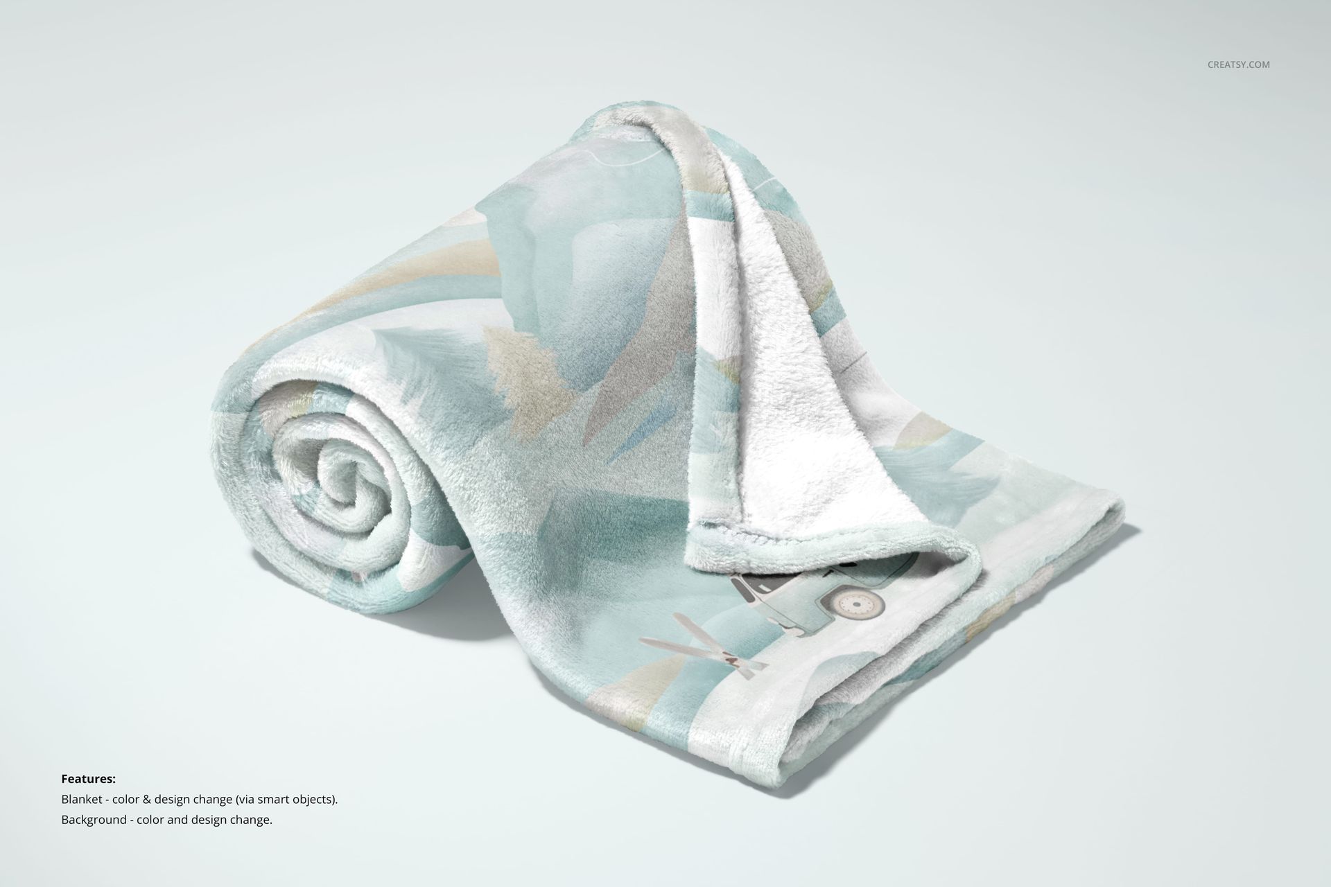 Rolled fleece blanket with soft pastel abstract pattern displayed on a light background in a PSD mockup scene.