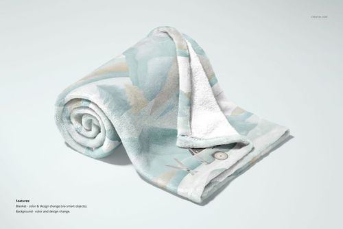 Rolled fleece blanket with soft pastel abstract pattern displayed on a light background in a PSD mockup scene.