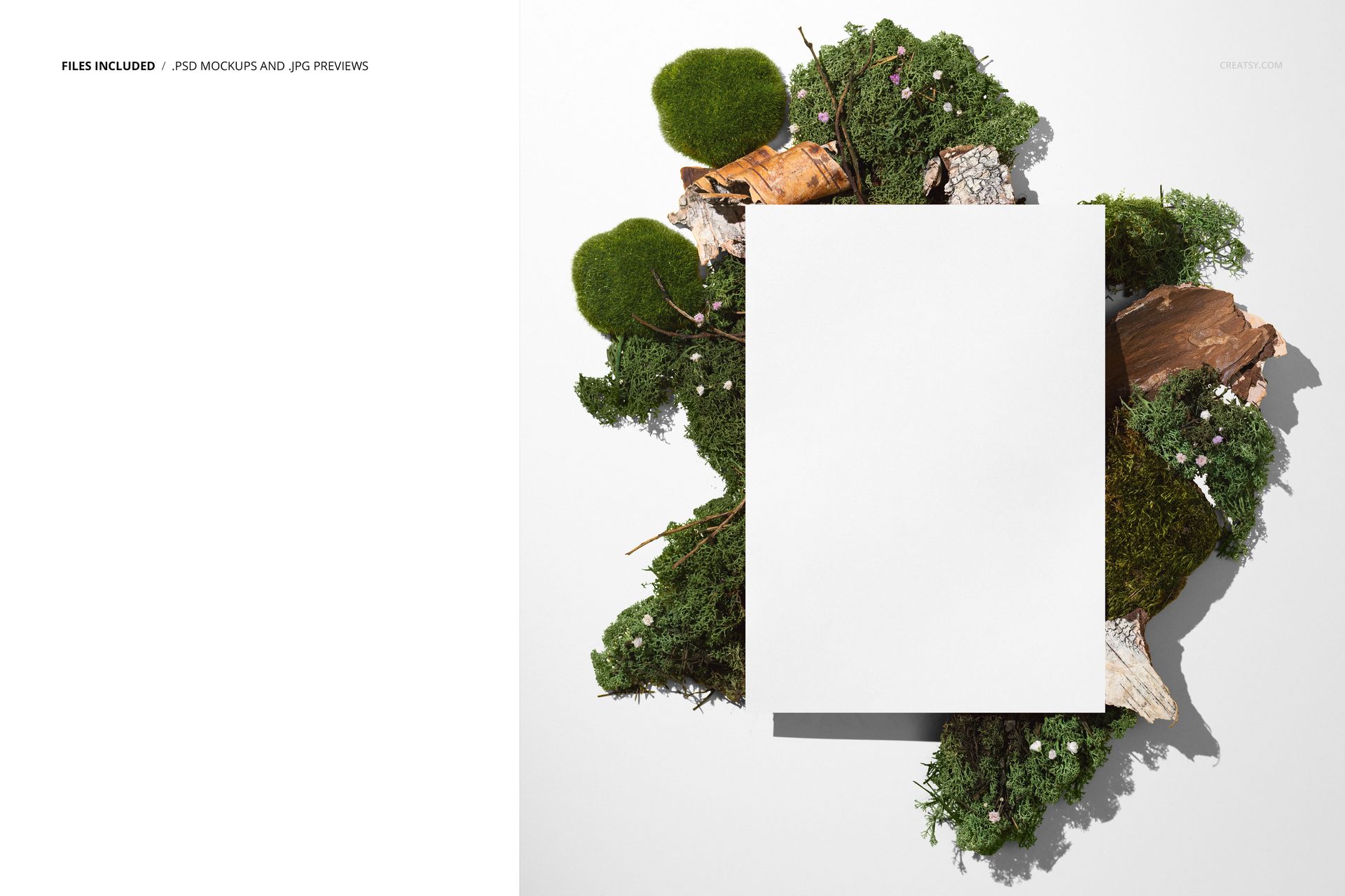 Front view of a blank poster mockup placed on a white surface, surrounded by green moss, bark, and small flowers.