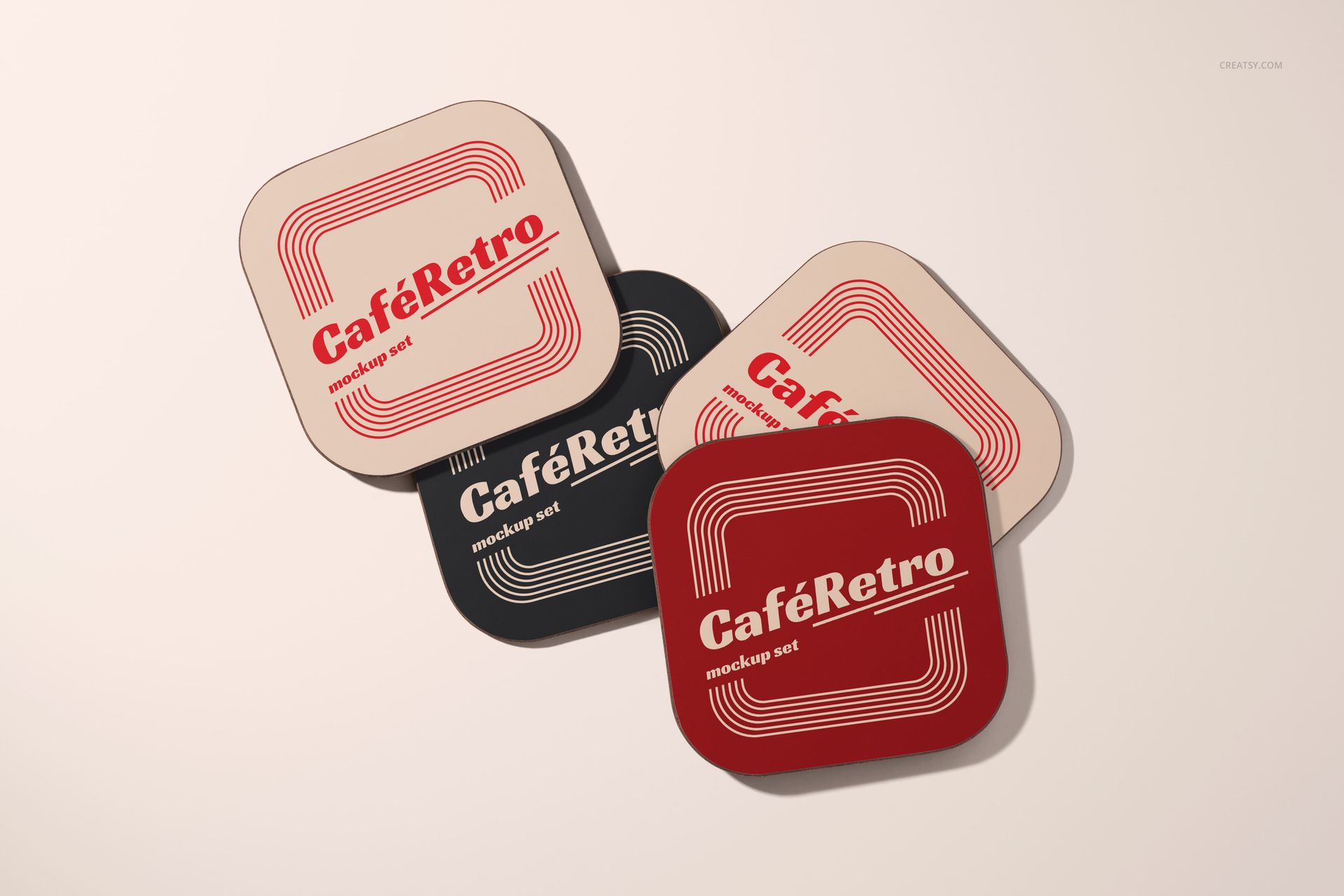Top view of wooden base coaster mockup set featuring red, black, and beige coasters with vintage designs.