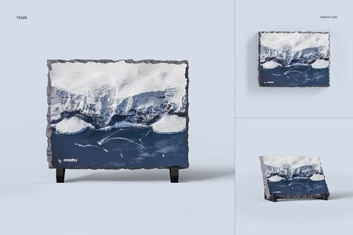 Rock slate mockup featuring a blue and white mountain scene, displayed upright and at an angle on pale surface.