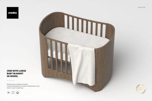 Wooden crib with rounded edges and vertical slats, featuring a large white baby blanket draped over the side.
