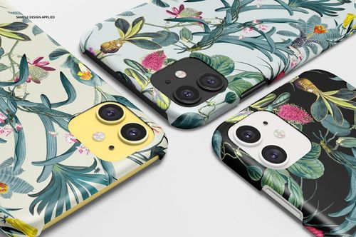 PSD mockup of multiple iPhone 11 matte cases with tropical plant motifs, arranged in a diagonal composition.