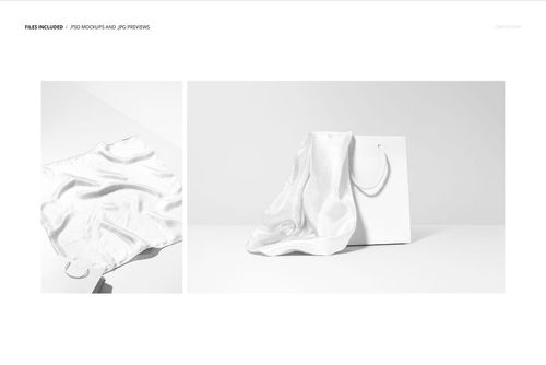 Silk scarf mockup with hand-rolled edges, laid out flat beside a standing white paper bag under soft lighting.