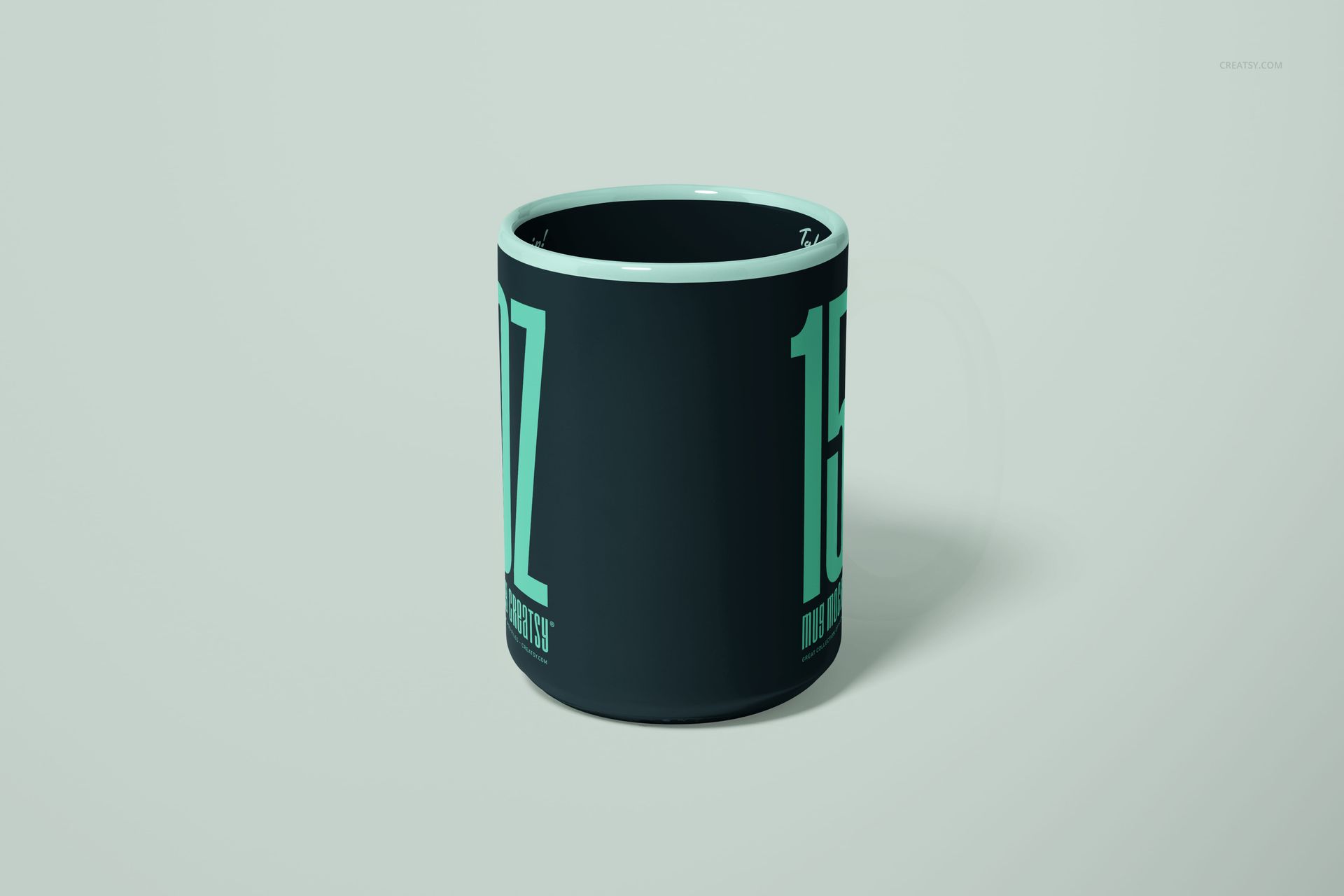 15oz mug mockup featuring bold light teal lettering on a dark surface, displayed with a simple neutral backdrop.
