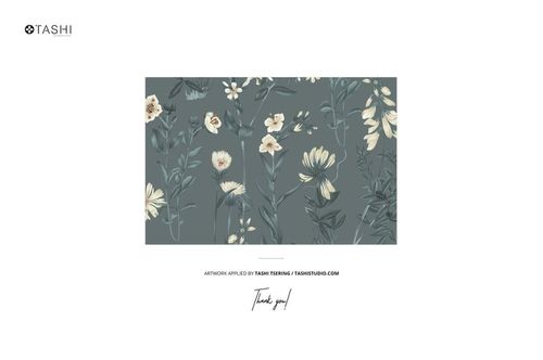 Front view of fabric rolls mockup featuring a muted green background with cream and yellow floral patterns.